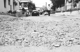 A potholed road at Sector 12-A in Panchkula.