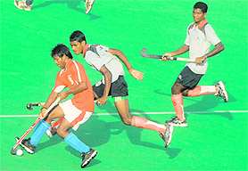 A match in progress during the All-India Inter-SAI Regional Hockey Tournament in Chandigarh on Monday. 