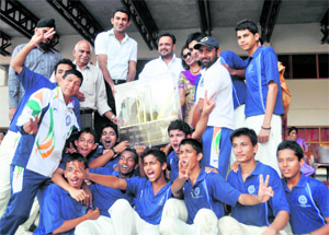 The Aryan School team with the Shri Rohitash Singh Memorial Inter-school Boys Super 8s Cricket trophy in Dehradun on Monday.