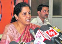 Nirmala Sitharaman, national spokesperson for the BJP, addresses a press conference in Dehradun on Monday.