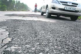 The national highway No. 10 portion from Sorkhi village to Hansi town is full of potholes at several places, making travel on it a risky affair.