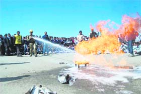 Firefighters take part in mock drill, organised by the disaster management authority, at the Ridge in Shimla 