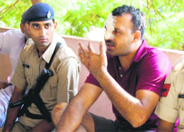 A Maruti Suzuki contractor in police custody after he opened fire during a clash in Gurgaon on Sunday. 