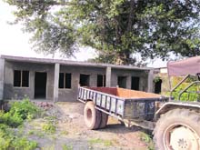 A view of the building being constructed by villagers in hope of more compensation at Dung-Matti village in Pathankot. 