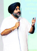 Deputy Chief Minister Sukhbir Badal give power-point presentation in Ludhiana on Monday.