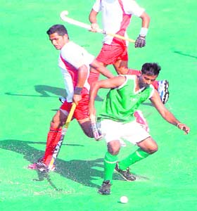 A match between WC Gandhi Nagar and Sub Centre Lucknow in progress at the Hockey Stadium, Sector 42, Chandigarh, on Tuesday
