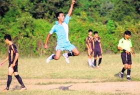 On cloud nine: A player of Seven Oaks School jumps in joy after his team scored a goal against Doon Valley School (in black) in the Col Sashi Shamsher JB Rana Memorial Inter-school Football Tournament in Dehradun on Tuesday