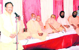 Uttarakhand Chief Minister BC Khanduri addresses a religious function in Haridwar on Tuesday. 