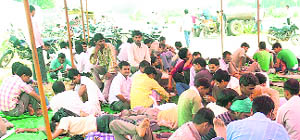 Casual workers stage a dharna outside Marutis Manesar plant in Gurgaon district on Tuesday