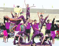 Gymansts display their skills on the concluding day of the Punjab Games for Women