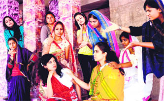Actors rehearsing for the play Kajari Ban.