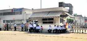 Striking Maruti Suzuki employees sitting on a dharna at one of the companys plants in Gurgaon district
