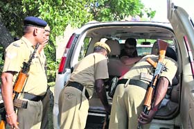 CRPF cops search a vehicle at a naka in Hisar on Wednesday