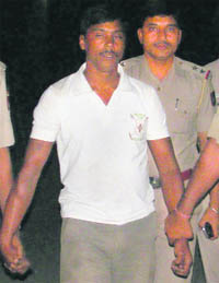 The murder accused in police custody in Chandigarh on Thursday