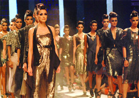 Models display creations of designers Rohit Gandhi and Rahul Khanna on the last day of Wills Lifestyle India Fashion Week at Pragati Maidan in New Delhi on Wednesday Night.