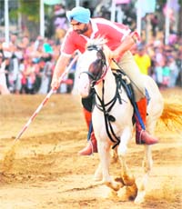 Indian equestrian player Jaswinder Singh competes during the finals of the South Asian Beach Games in Hambantota on Thursday