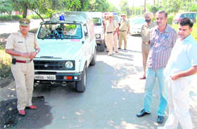 Police officials arrive at a house after getting an alert on a firing incident as part of a mock drill in Sector 15, Panchkula, on Friday.