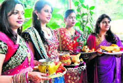 Women ready for puja on the Karvachauth festival in Dehradun on Saturday