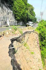 The partially damaged Circular Road in Jammu. 