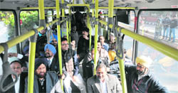 MC Commissioner AK Sinha, Mayor Hakam Singh Gaispura, Senior Deputy Mayor Parveen Bansal and other officials and councillors, enjoy the ride in a low-floor bus, which would be introduced in November.