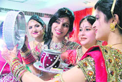 Women celebrate Karva Chauth in a club in Ludhiana