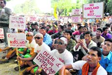 Members of the Bodo community hold a rally demanding a separate state to be  carved out of Assam, at Dhekiajuli in the states north on Saturday.