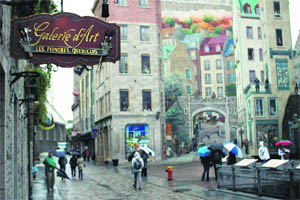Many murals and tapestries on the city walls bear testimony to Quebec people's love of art Photo: WonGoo Kang