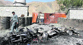 A policeman at the site of a suicide bomb attack in Panjshir province of