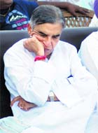 An apparently exasperated Pawan Kumar Bansal at the community centre.