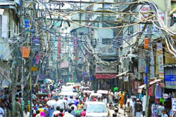 A web of wires hangs above Nai Sadak at Chandni Chowk in Delhi. 