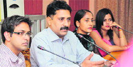 Protesting residents of the area address mediapersons in Jalandhar on Sunday.