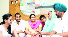 Leading potato farmer Jaswinder Sangha with his family at their house in Jandu Singha in Jalandhar.