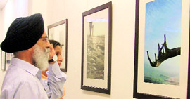 Poet Surjit Patar at an art exhibition organised at the Artmosphere Gallery in Ludhiana on Sunday.