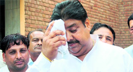 INLD candidate Ajay Chautala in a dejected mood after the announcement of the result.