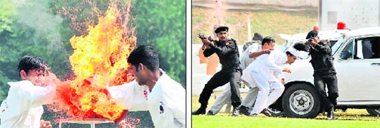 NSG commandos display martial art skills and; (right) commandos during a mock exercise on the occasion of the 27th Raising Day of the National Security Guards on the NSG campus in Manesar, Gurgaon