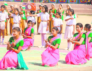 Youth perform a cultural item during the inauguration of the Jammu Kathua Range Sports Festival in Jammu on Monday. 