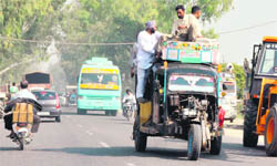 An overloaded three-wheeler that can become a cause of a fatal accident