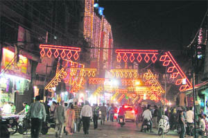 An illuminated Chaura Bazaar; and (right) Chinese lights displayed outside a shop in Ludhiana.