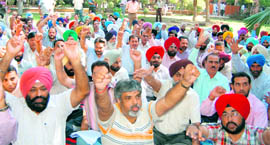 Members of the Diploma Engineers Association protest against the state government outside the DC s office in Amritsar on Tuesday.
