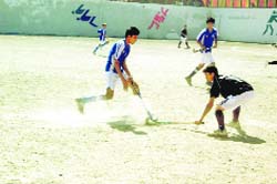 Players in action in a match in the All-India Inter-school Hockey Tournament in Mussoorie on Tuesday.