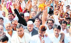 Small traders and vendors hold a protest in Haridwar on Tuesday. 