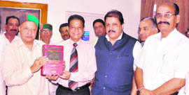 Virbhadra Singh releases the book written by @@Dr Barowalia in Shimla.