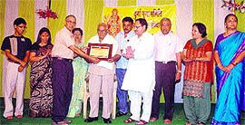 Dr Naryan Lal Nadda receives the Lifetime Achievement Award at a function in Bilaspur.