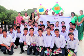 Students of Him Academy Public School after attending the workshop.