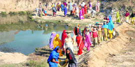 Women work under the MNREGA scheme at a village in Jalandhar.