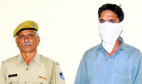 Accused Satpal Singh in police custody in Jalandhar.