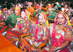 Youths from different parts of the country wait for their turn to perform at the two-day Youth Festival in Srinagar