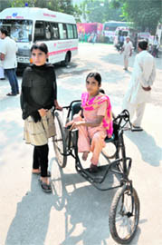 A youth requests a cop to let him meet Chief Minister Parkash Singh Badal; and a physically challenged woman, who kept waiting, but could not air her grievances in Ludhiana.