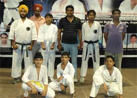 Students who won medals at the South Asian Karate Championship held in Gujarat