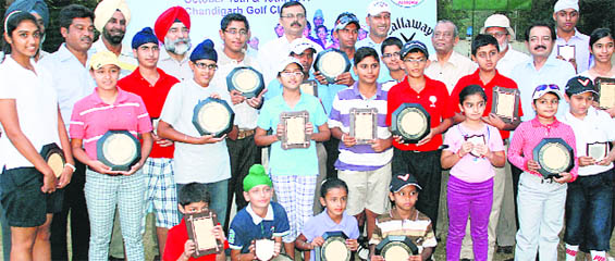 The winners of 3rd CGA Juniors Golf Tournament 2011 along wih trophies during prize distribution function at Chandigarh Golf Club, Chandigarh on Wednesday. 